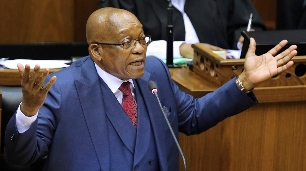 President Jacob Zuma gestures as he addresses the parliament in Cape Town