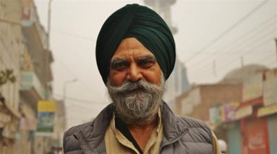 Rupinder Singh Kahlon in the bazaar of Nankana Sahib [Sabrina Toppa/Al Jazeera]