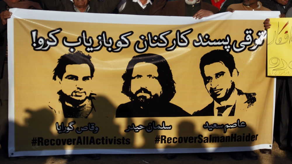 Asim Saeed, right, was among five social media activists picked up within days of each other [Anjum Naveed/AP]