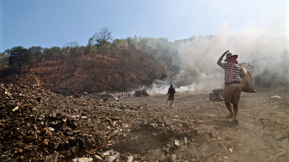 Despite the dangerous and unprofitable nature of rubbish scavenging at Tibar, many of those who work here claim they are satisfied with their lot [Ian Lloyd Neubauer/Al Jazeera] 