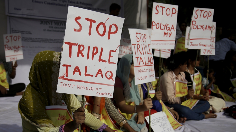 Activists of various social organisations hold placards during a protest against "Triple Talaq", a divorce practice prevalent among Muslims in New Delhi, India, Wednesday, May 10, 2017.