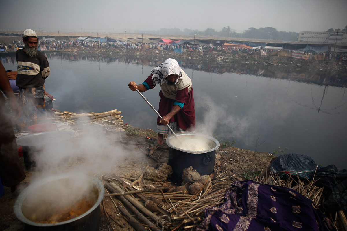 ''I am a teacher in Madrasa and I cook every year at Bishwa Ijtema for my brothers. They love my cooking.'' said Ibrahim Yasin. [Mahmud Hossain Opu/Al Jazeera]