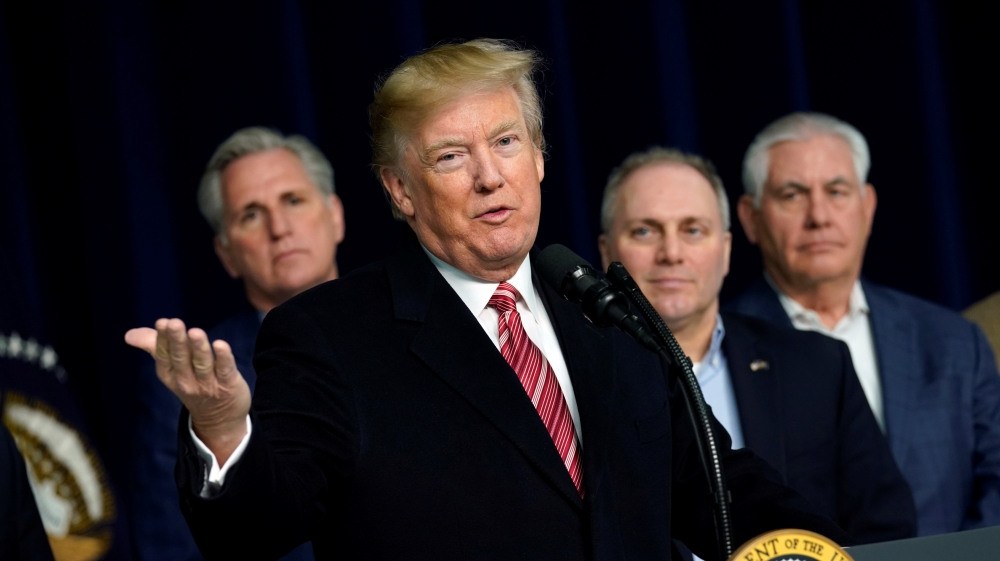 President Donald Trump speaks to the media after the Congressional Republican Leadership retreat