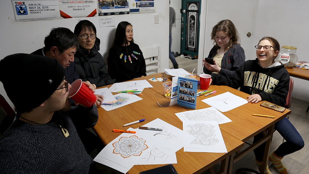 An art class by An Su-min at Teach North Korean Refugees, an NGO helping defectors settle in South Korea [Faras Ghani/Al Jazeera]
