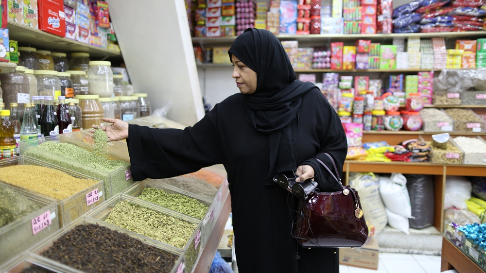 Lulwa Al Obaidli suffers twofold from the blockade as her potato snack business struggles to source basic ingredients and communication with family dispersed across the GCC is increasingly challenging [Showkat Shafi/Al Jazeera]