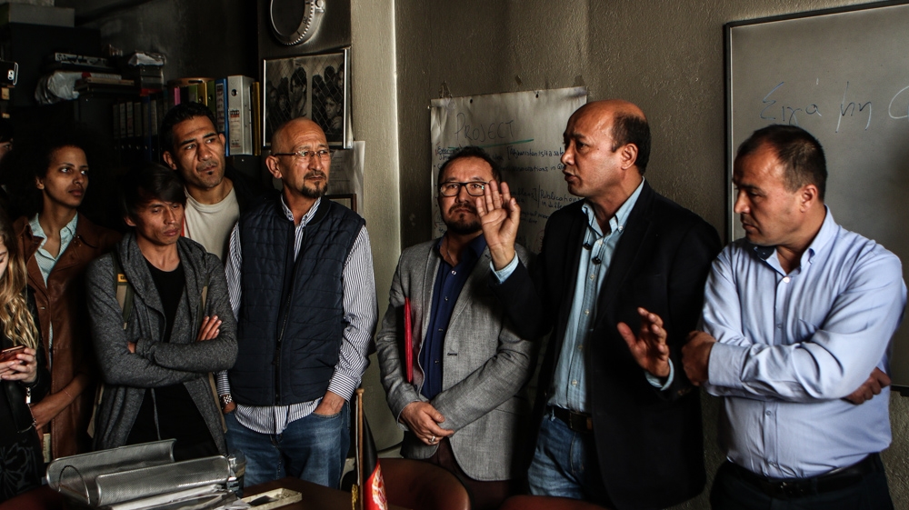 Yonous Muhammadi addresses reporters after a far-right group attacked the Afghan Community in Greece's office [Nick Paleologos/SOOC/Al Jazeera] 