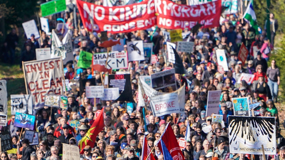 Thousands march in protest against Morgan's Trans Mountain pipeline in southern British Columbia [File: Nick Didlick/Reuters] 