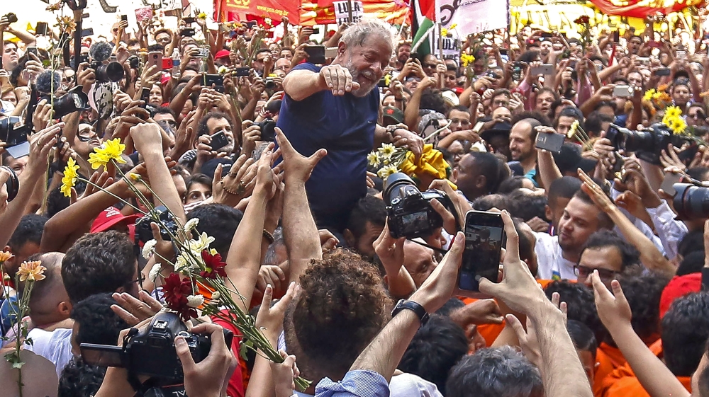 Lula maintained his corruption conviction was a way for political rivals to make sure he does not run in October's elections [Miguel Schincariol/AFP]