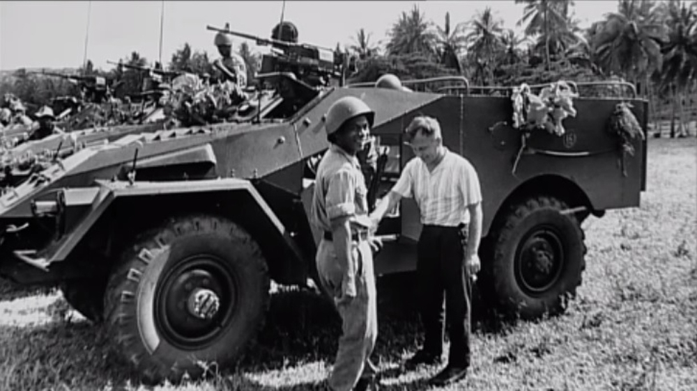 Mo's photos of military training in Zanzibar made his name, but almost cost him his life [Mohamed Amin/Screengrab/Al Jazeera]