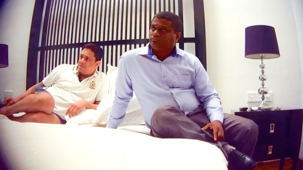 Sri Lankan groundsman Tharanga Indika, right, was reportedly paid around $40,000 for doctoring the pitch to ensure certain outcomes [Al Jazeera]