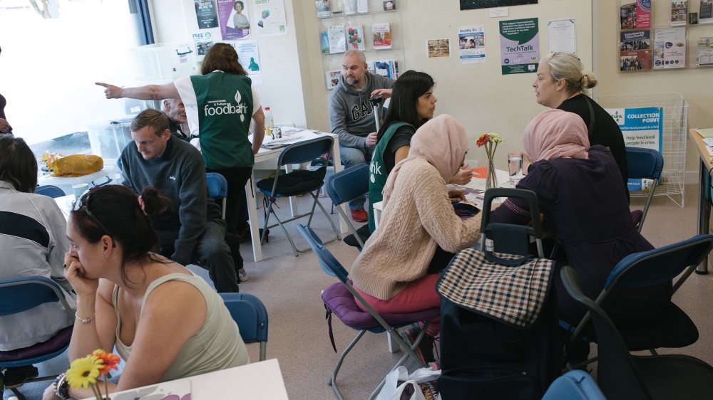 

Food-bank staff attend to clients [James Rippingale/Al Jazeera]

Food-bank staff attend to clients [James Rippingale/Al Jazeera]