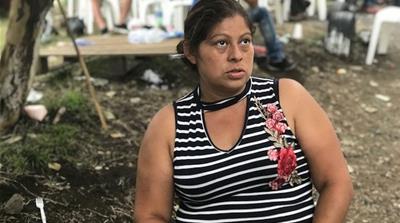 
Eva Ascon was so traumatised after identifying the charred remains of her six nephews and nieces that she had to be sedated [Louisa Reynolds/Al Jazeera]
