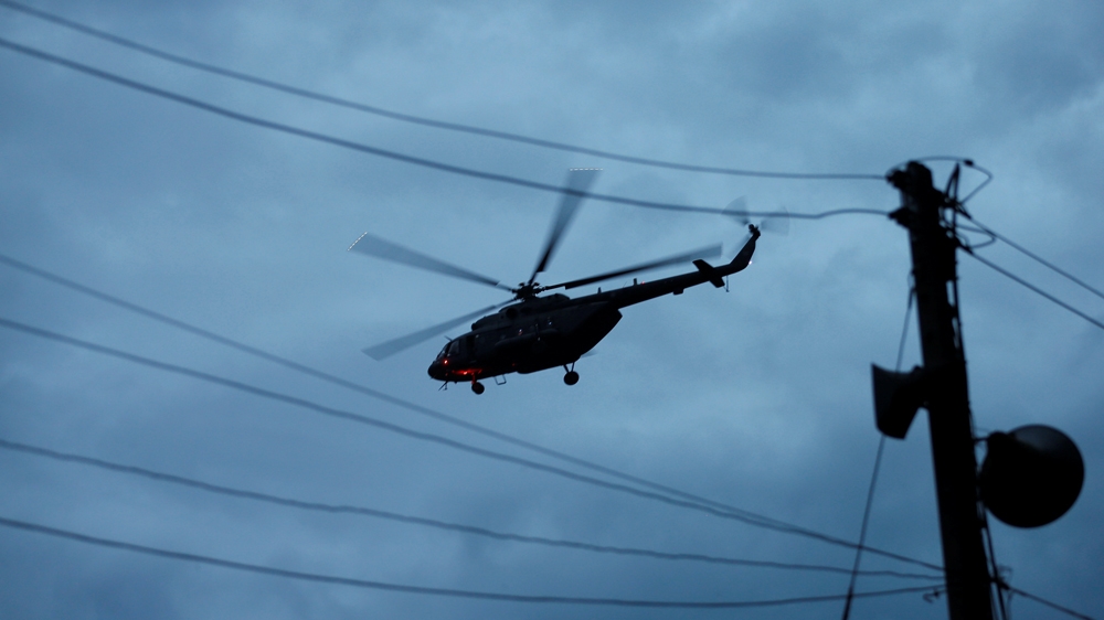 A military helicopter believed to be carrying rescued schoolboys takes off near Tham Luang cave complex in the northern province of Chiang Rai [Soe Zeya Tun/Reuters]