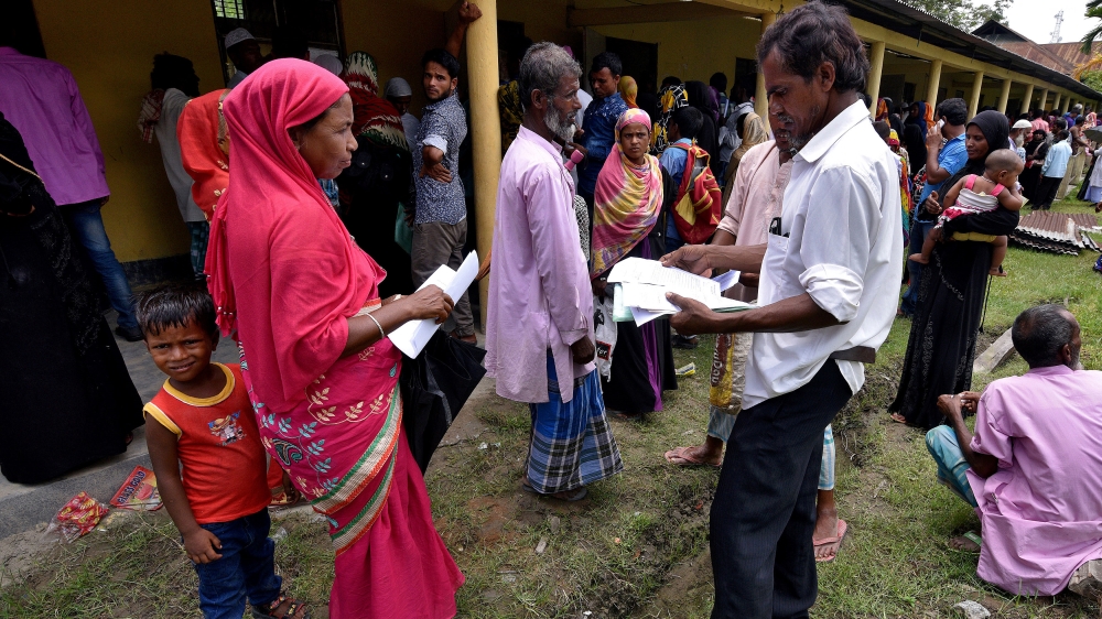 Villagers wait outside the National Register of Citizens (NRC) centre to get their documents verified by government officials, at Mayong Village in Morigaon district, in the northeastern state of Assa