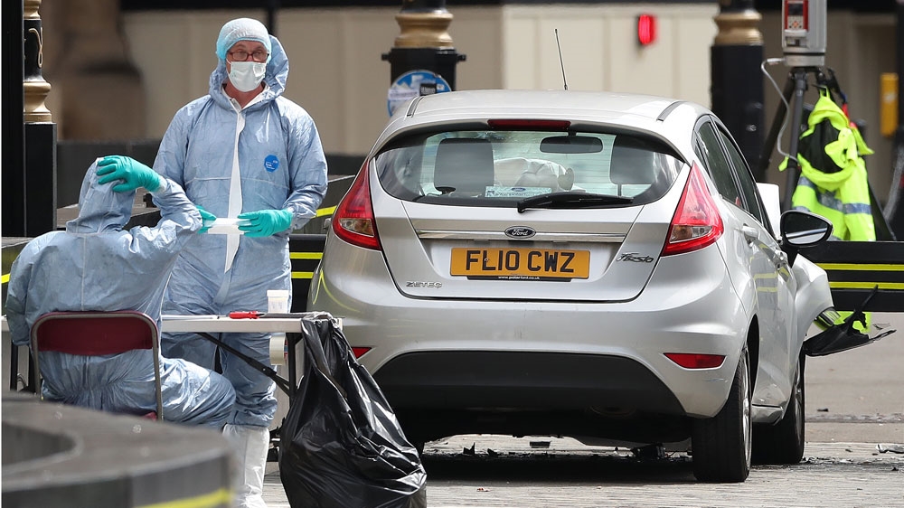 The car mounted the pavement and crashed into a barrier outside the parliament [AFP]