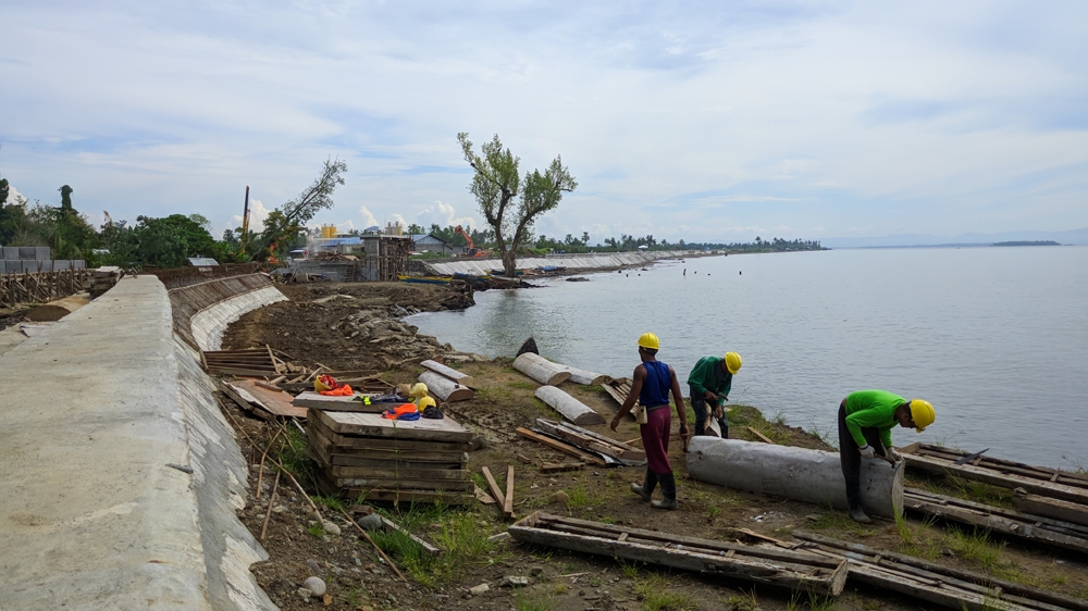 Critics argue that the government and private sector have failed to consider that a 27-km sea wall will make it more difficult for fishermen to make a living and cause long-term environmental damage [Khalil Majeed/Al Jazeera]