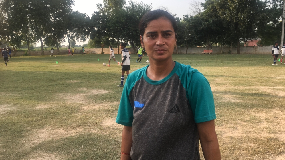 Sonika Bijaria, 37 is one of two female coaches in Haryana state. She has been with the Alakhpura FC since 2014 [Adnan Bhat/Al Jazeera]