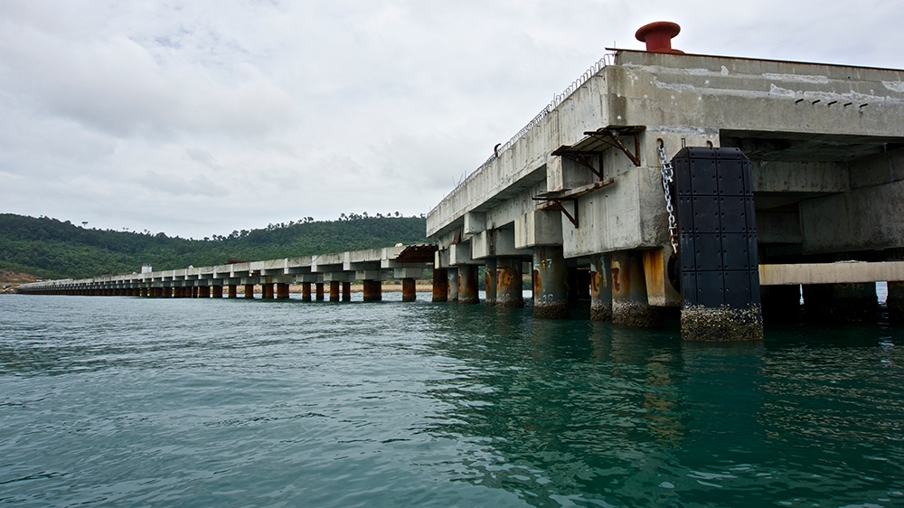 The unfinished port, part of the Chinese redevelopment, stretches out into the Gulf of Thailand [Andrew Nachemson/Al Jazeera]