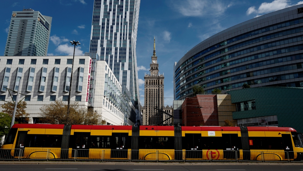 A tram rides through the centre of Warsaw