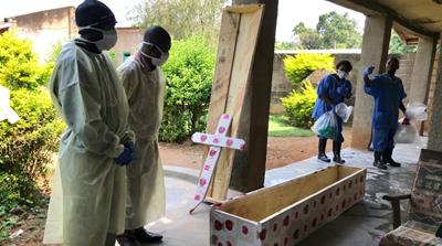 Health workers face distrust and attacks by rebels [Nyka Alexander/WHO Handout/Reuters]