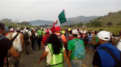 Thousands of people set out from Arriaga [Sandra Cuffe/Al Jazeera] 
