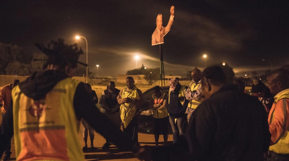 In parts of Galeshewe where the roads are particularly bad, members of resident vigilante group Operation Wanya Tsotsi conduct foot patrols [Shaun Swingler/Al Jazeera]