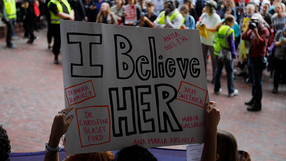 Protesters gather for a really against Supreme Court nominee Brett Kavanaugh in Boston [File: Brian Snyder/Reuters] 