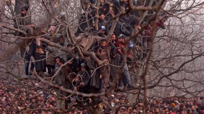 People waiting to offer funeral prayers for Wagay, a suspected rebel killed in gun battle with Indian forces [Danish Ismail/Reuters]