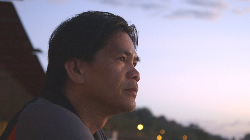 Mutang returns to his Borneo village for the first time in 25 years [Vincent Gonneville/Al Jazeera]