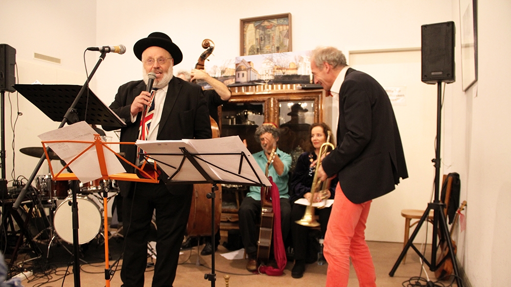 Rabbi Walter Rothschild, wearing a British flag necktie, reclaimed his German citizenship in 2017 after his birth country of Britain began the process of exiting the European Union, known as Brexit [Veronica Zaragovia/Al Jazeera]