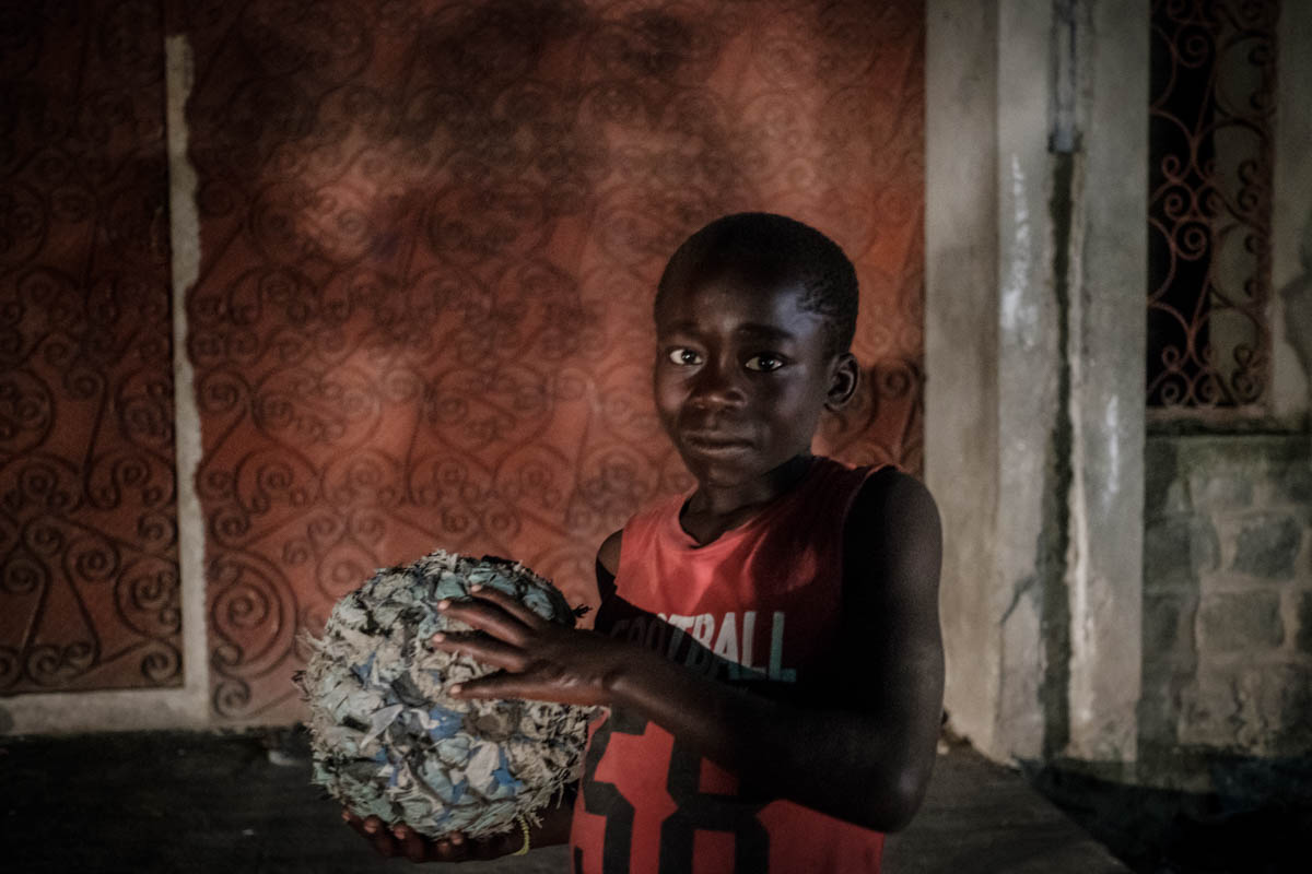 The members of Shusha Ma Flow encourage younger street children, like this boy, to believe in themselves. Their favorite songs are about the life on the streets and time in jail, politics and colonial