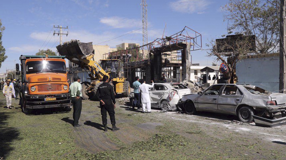 Authorities said officers managed to block the vehicle and started firing at the driver, who then detonated his explosives [Tasnim/AP]