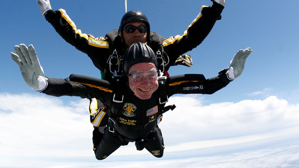Bush celebrated his 85th birthday by jumping with the Army's Golden Knight parachute team in a tandem jump in Kennebunkport, Maine on June 12, 2009 [Reuters]