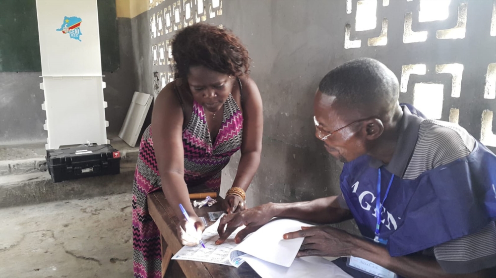 
Blandine Kiemba said electronic voting will be difficult for people who do not know how to read [Hamza Mohamed/Al Jazeera]
