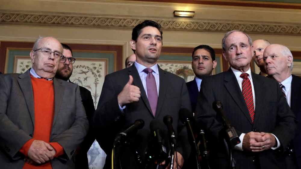 Carlos Alfredo Vecchio, charge d'affaires appointed by Venezuela's opposition leader, talks to the media after meeting [Yuri Gripas/Reuters]