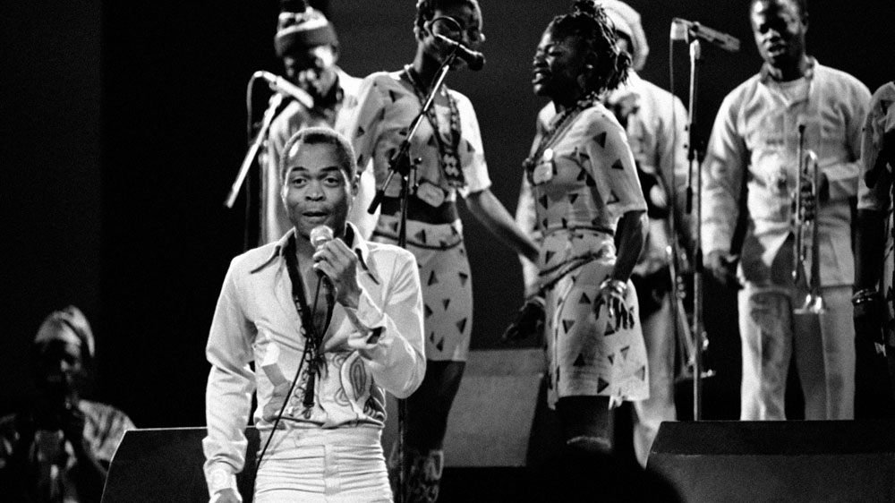 Nigerian musician and composer Fela Anikulapo Kuti performs on September 13, 1986 with his band in Paris, France [File: Laurent Rebours/AP]