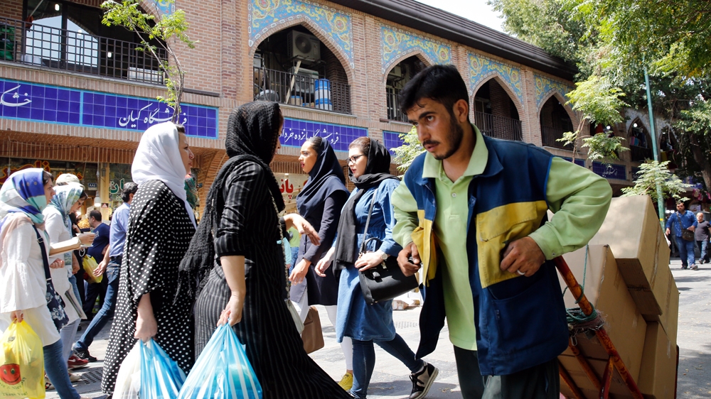 The US reimposed sanctions against Iran in August and November [Abedin Taherkenareh/EPA]