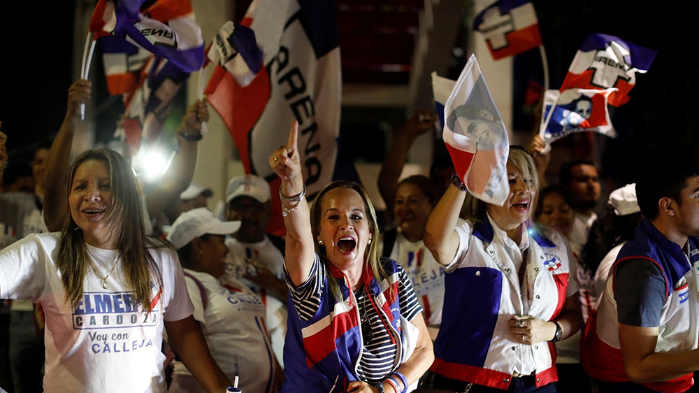 Supporters of conservative presidential candidate Carlos Calleja cheer during an electoral event [Jose Cabezas/Reuters] 