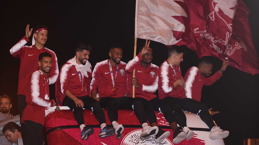 The Qatari national football team at the victory parade [Sorin Furcoi/Al Jazeera]
