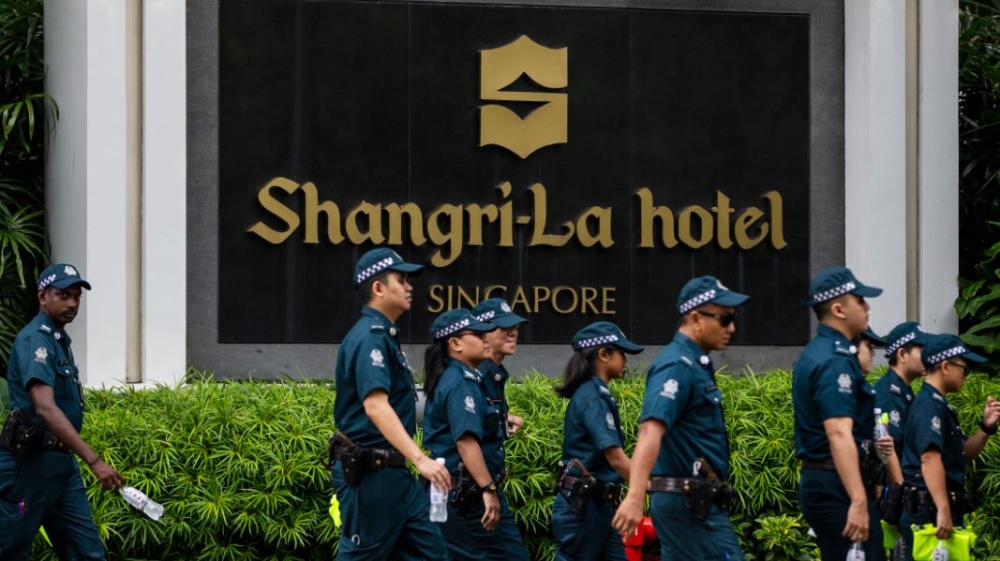 Trump stayed at the luxury Shangri-La Hotel [File: Yong Teck Lim/AP Photo]