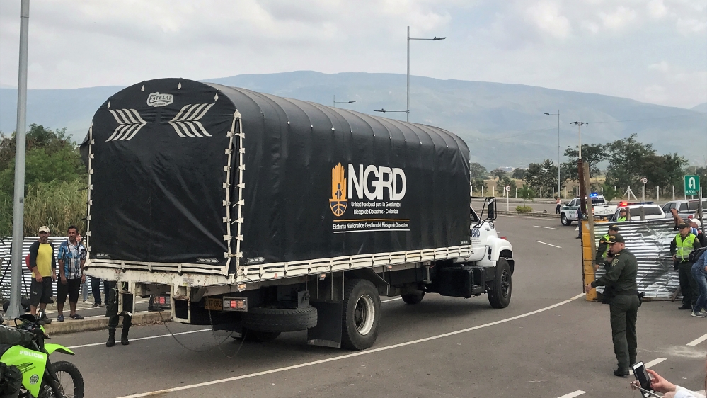 Aid arrives through the guarded entrance to the Tienditas border bridge in Cucuta, where Venezuela has barricaded entrance