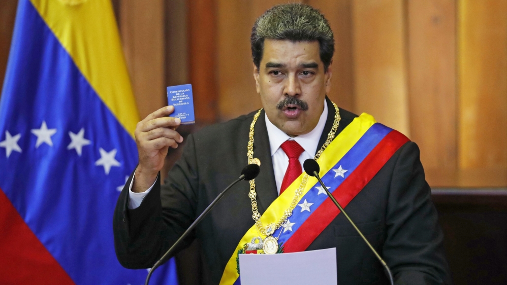 Maduro says Guaido will have to face consequences, as 'nobody can be above the law' [File: Ariana Cubillos/AP]