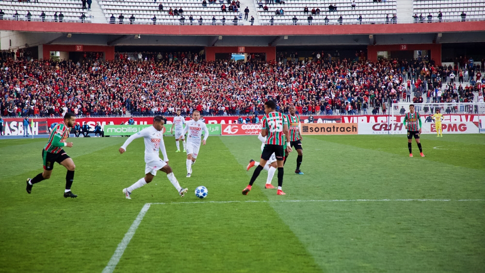 For some fans, Algeria's political upheaval overshadowed the match [Maher Mezahi/Al Jazeera] 