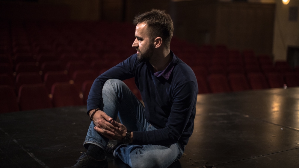 Sinan Kajtazi pictured at the National Theater of Kosovo [Valerie Plesch/Al Jazeera]