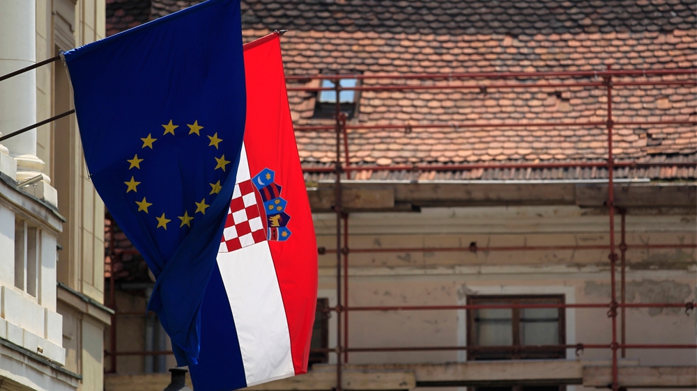 The European Union and Croatian flags wave in the wind at Zagreb''s downtown The European Union and Croatian flags wave in the wind at Zagreb''s downtown June 19, 2013.