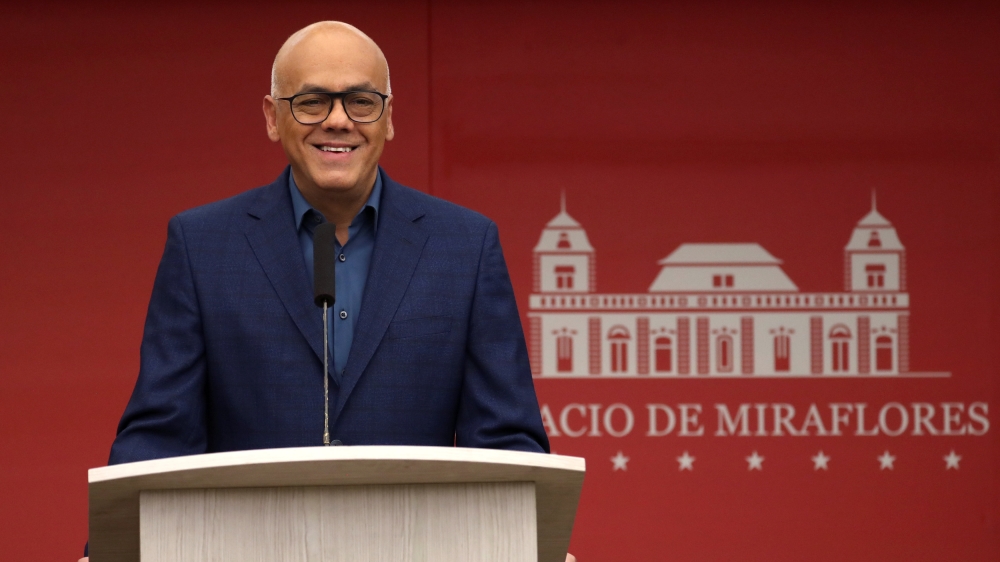Venezuela's Communications Minister Jorge Rodriguez talks to the media [Ivan Alvarado/Reuters]