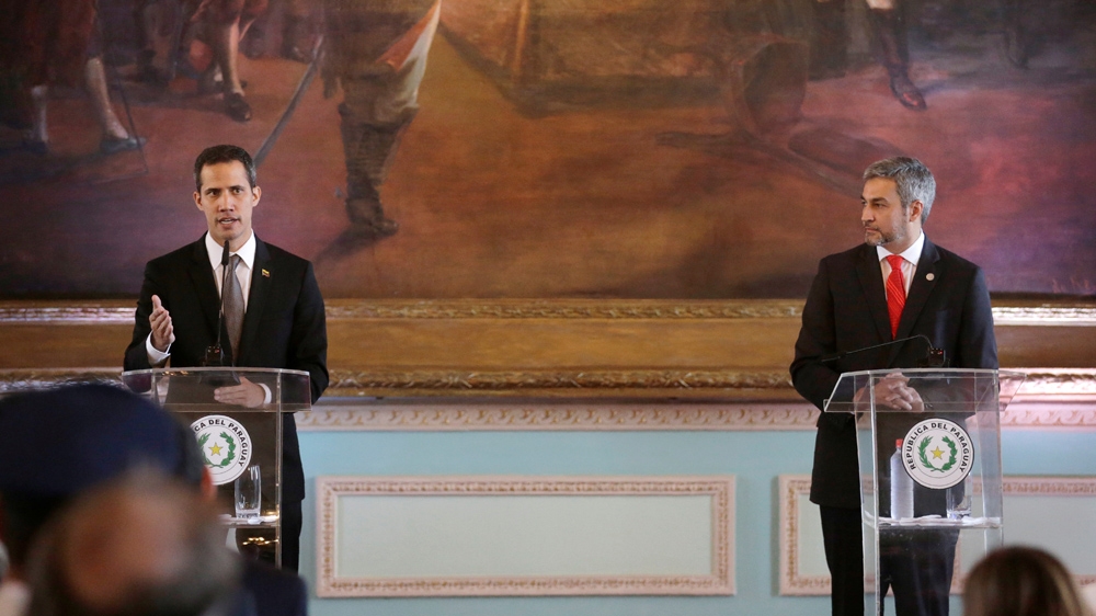 Guaido made the claims at a press conference with Ecuador's president [Jorge Adorno/Reuters]