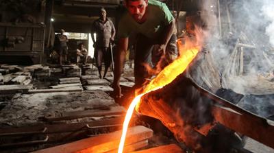 Automobile spare parts inside an iron casting factory in Ahmedabad, India