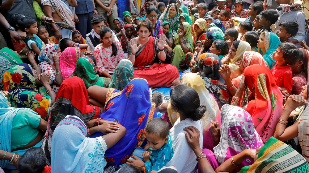 Priyanka Gandhi Vadra, centre, a leader of India's main opposition Congress party and sister of the party president Rahul Gandhi, gestures as she speaks with women during an election campaign meeting in Ayodhya, India, March 29, 2019 [Pawan Kumar/Reuters]