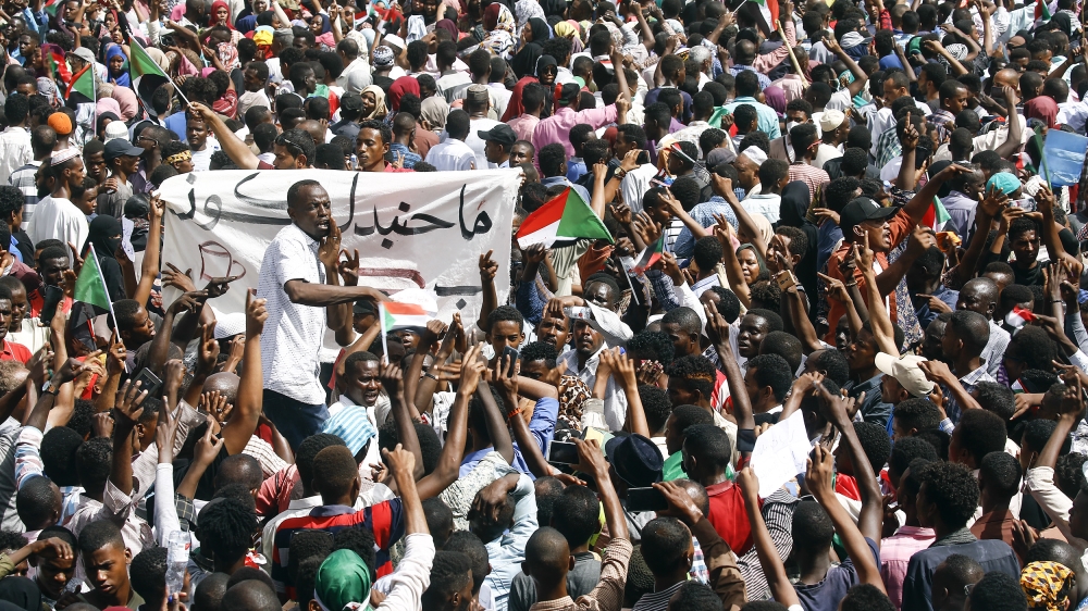Sudanese demonstrators gather in a street in central Khartoum on April 11, 2019, immediatly after one of Africa''s longest-serving presidents was toppled by the army. Organisers of protests for the ou